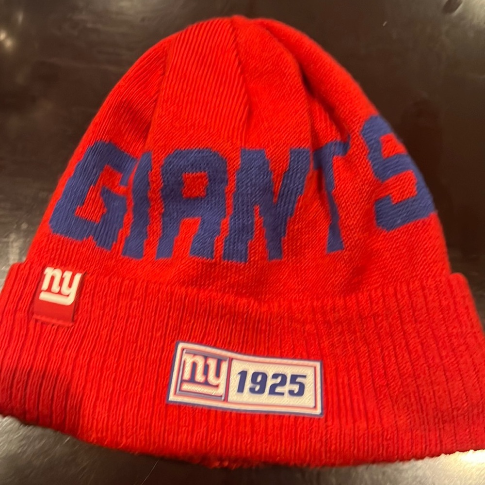 One size fits all Red toboggan.  Has a lining on the inside.